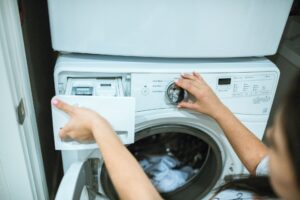 how to clean a front load washing machine detergent tray