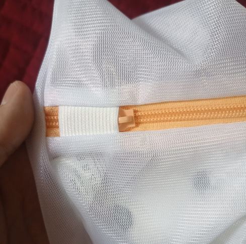 place sandals in laundry bag