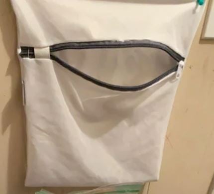 place swimsuit in laundry bag