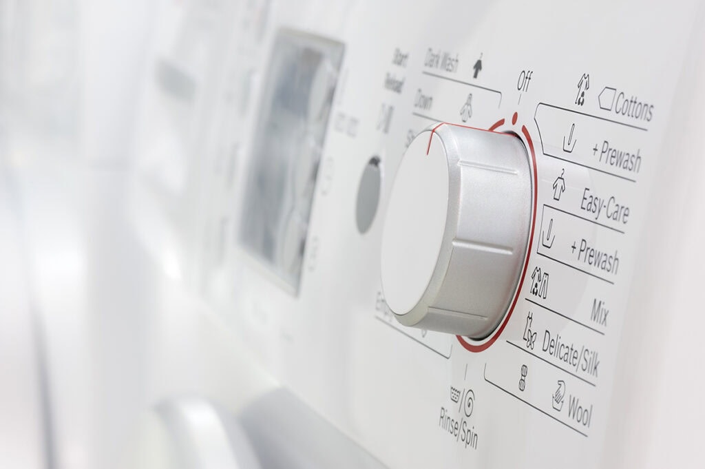 clean washing machine knobs