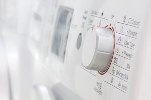 clean washing machine knobs