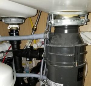 how does a garbage disposal work