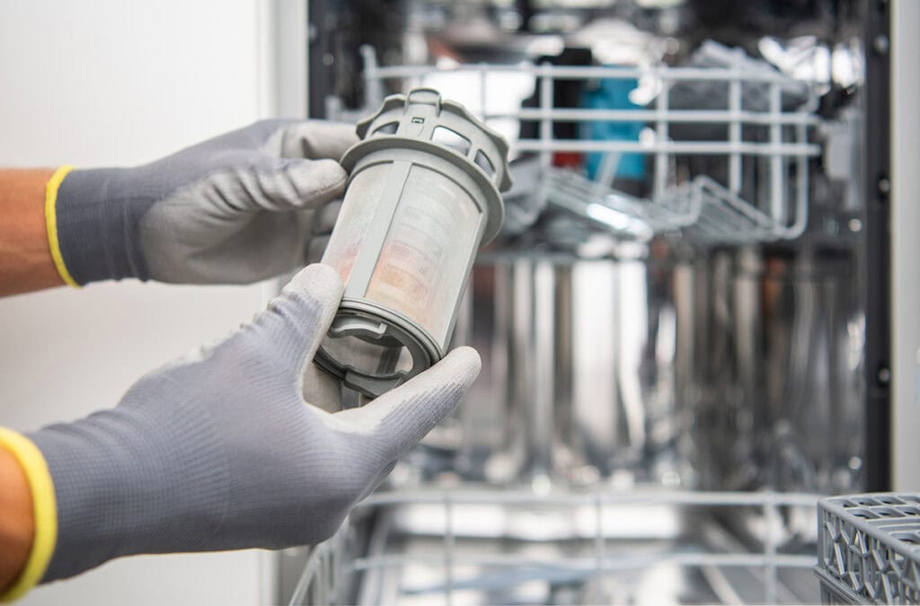 how to fix standing water in dishwasher