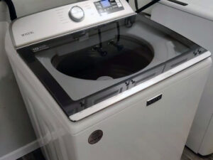 maytag washer empty top loader