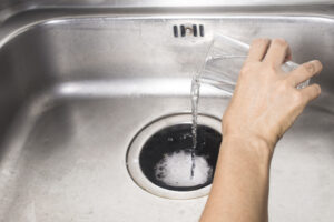 pour vinegar and baking soda