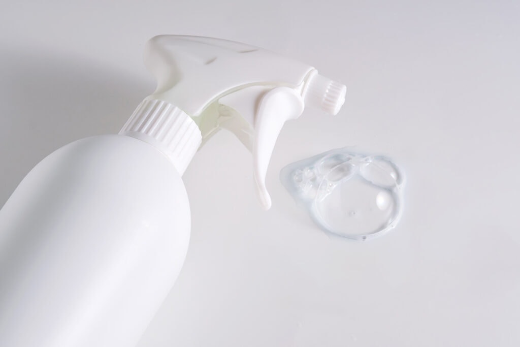 combine bleach and water in spray bottle