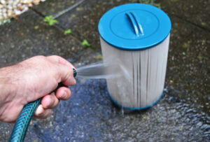 rinse hot tub filter