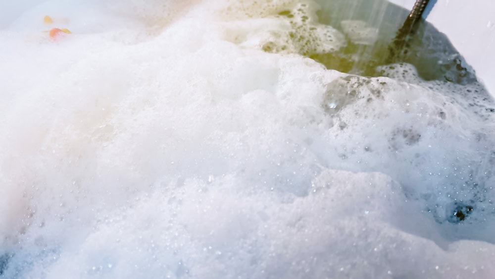 soapy water in tub