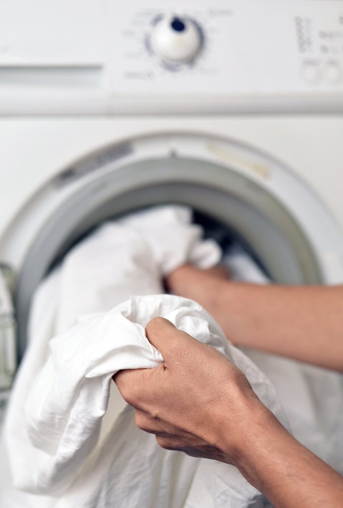 take bedsheets out of washer