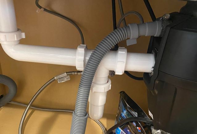 attach disposal drain hose