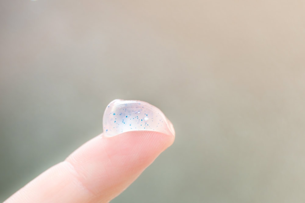 toothpaste on finger