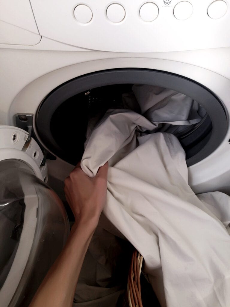 put shower curtain in washer1