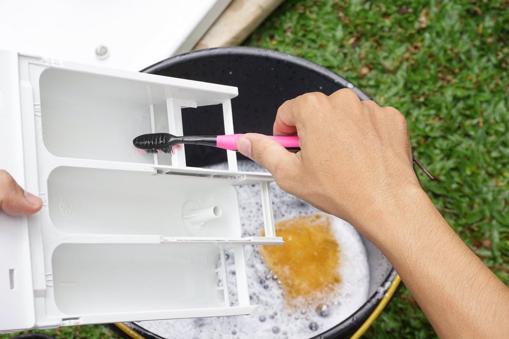 scrub detergent drawer